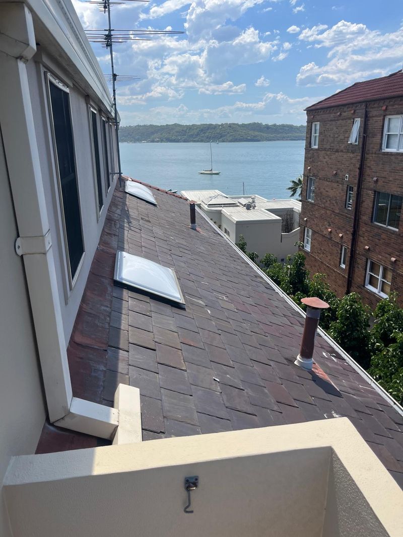 Roof works in progress on a Sydney home overlooking the harbour