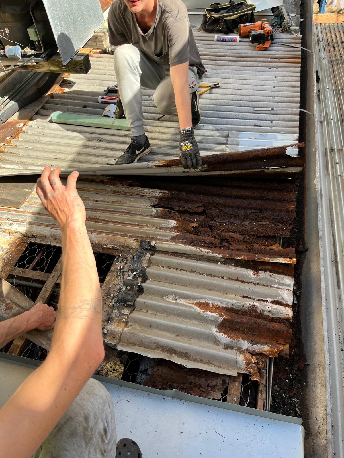 Repair work on corroded corrugated sheeting