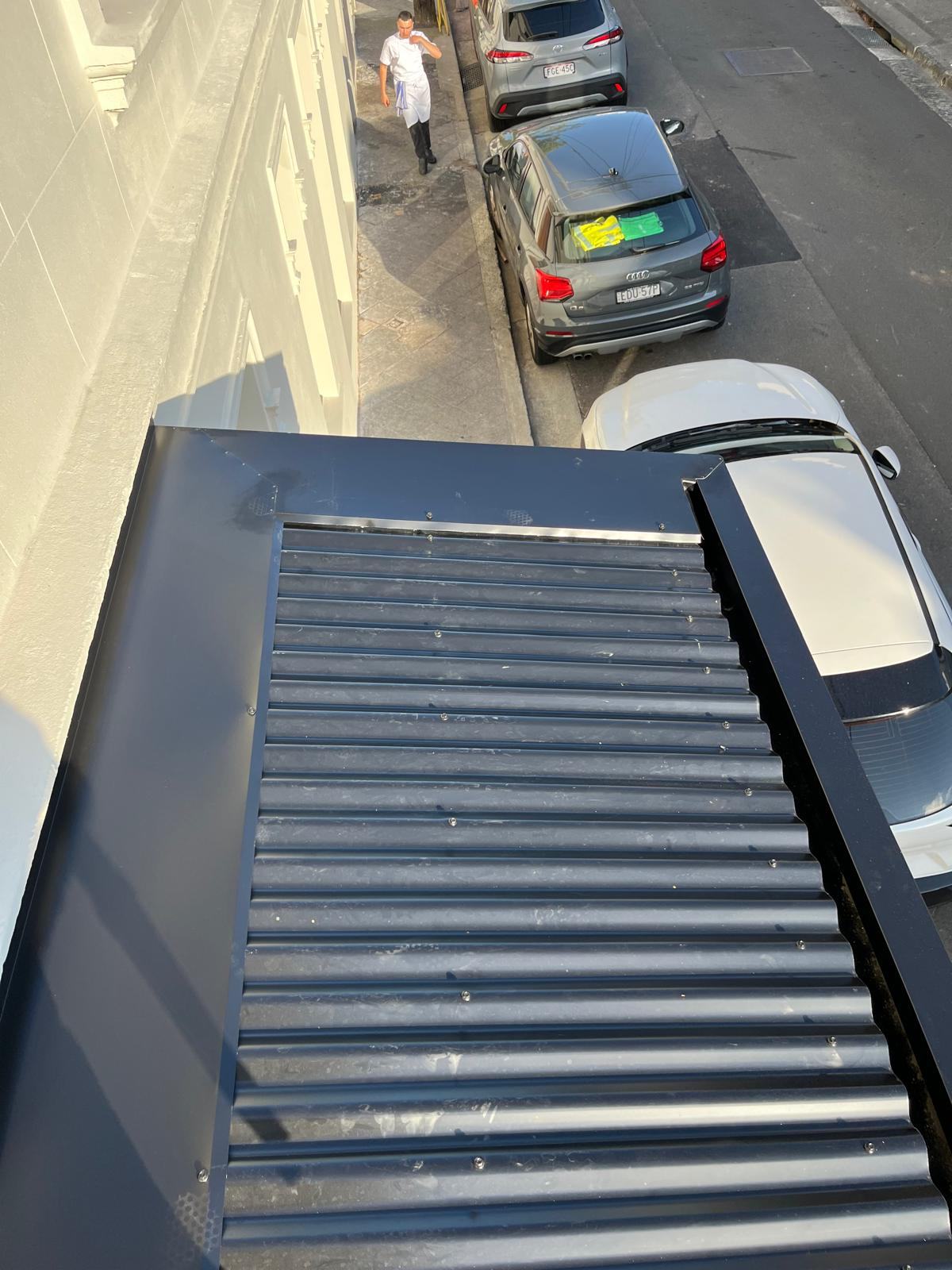A new dark Colorbond roof on a Sydney home
